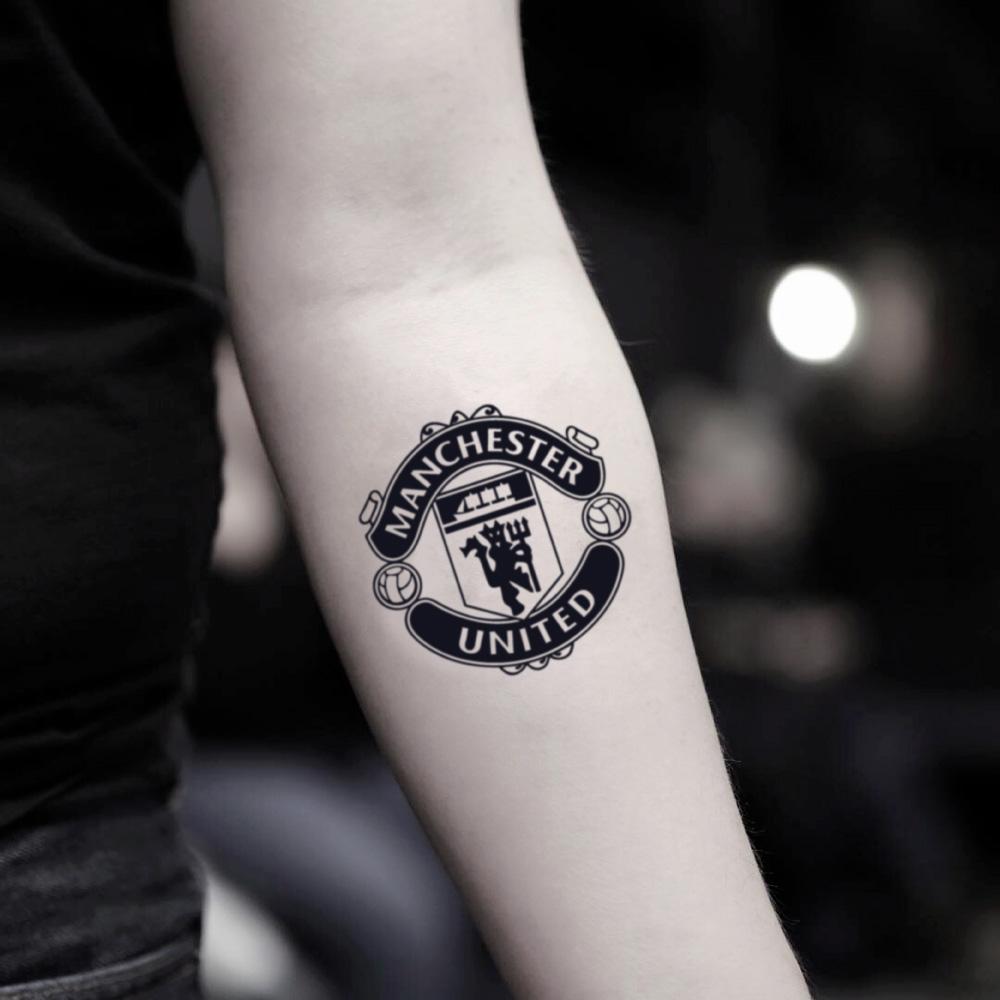 Manchester City fan gets Manchester United badge tattoo after raising over  10000 to help his sick son  The Independent  The Independent
